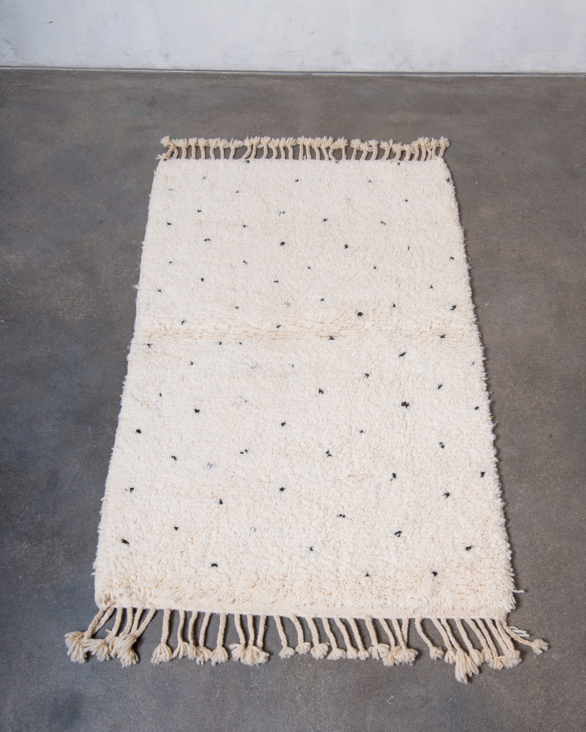 Modern, designer, handcrafted Berber rug from Morocco. Beniourain carpet with beautiful colours and patterns and fluffy wool texture.